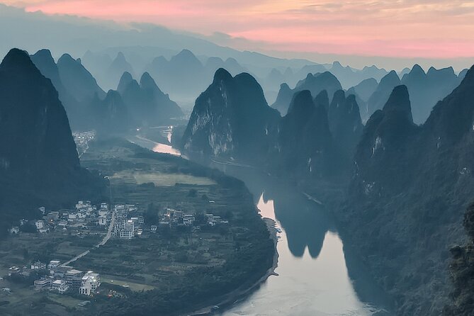 1-Day Guilin Tour to Reed Flute Cave, Xianggong Hill, Bamboo Boat and Night Show - What this Guilin day is trying to do