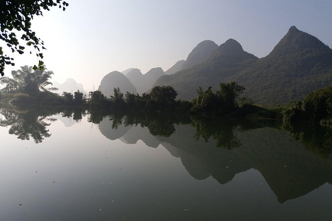 1 Day Yangshuo Countryside Cycling and Yulong bamboo boat Private Tour - Cycling through Yangshuo’s rice paddies