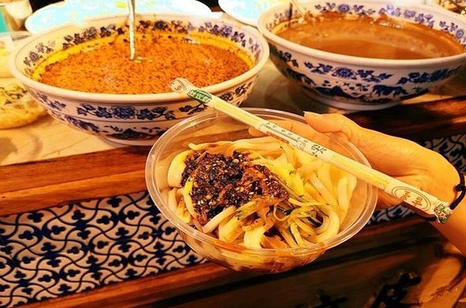 3-Hour Xi'an Muslim Street Food Walking Tour - Drum Tower Square and the city at night
