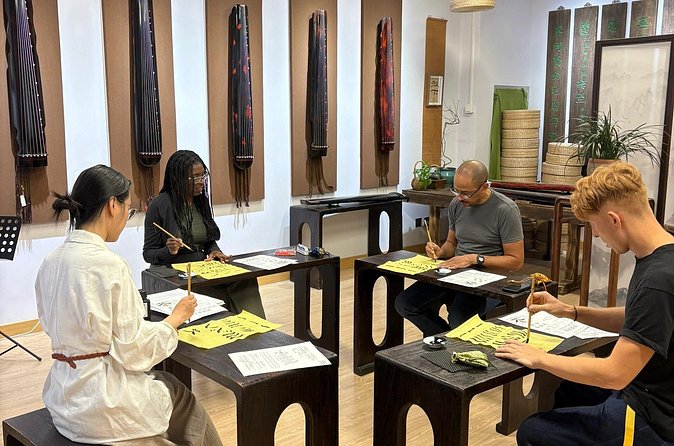 Beijing Culture: Tea Ceremony, Heritage Instrument & Calligraphy - Traditional clothing and the ritual setting
