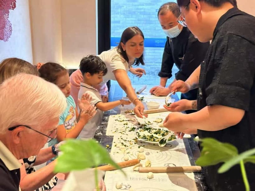 Beijing: Dumpling Making Workshop with Meal and Tea - Tea, beer, and the shared table