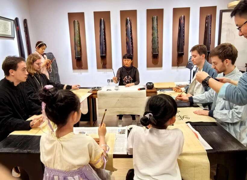 Beijing Hands-On Culture Tour: Tea, Instrument, Calligraphy - Hanfu rental and photos that mark the occasion