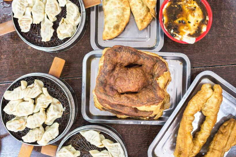 Beijing: Hutong Breakfast Food Tour - Mr. Yu’s beef flatbread and tofu pudding