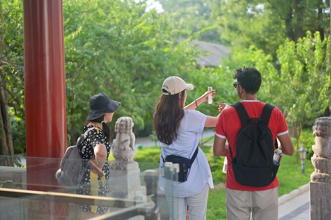 Beijing Hutong Walking Tour History, Architecture and Local Life - Zhengyang Shuju pairs a Yuan Dynasty pagoda with old Beijing photographs