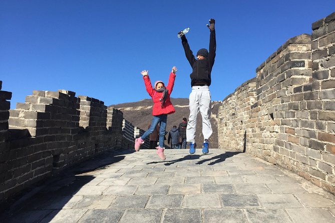 Beijing Mini Group Tour to Mutianyu Great Wall (Max 8+Tickets) - Reaching the ramparts at Mutianyu