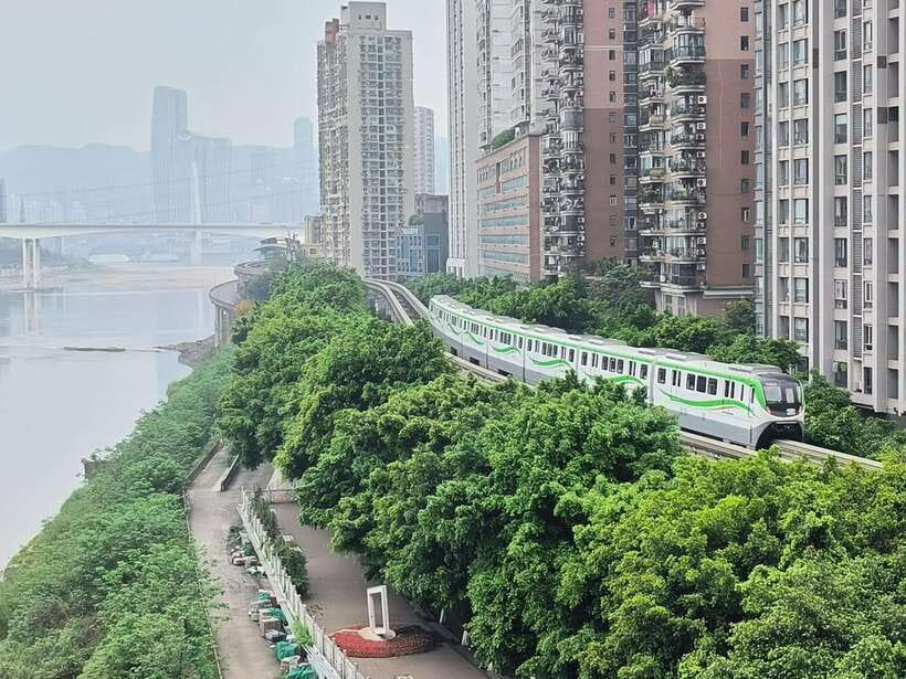 Chongqing: Mountain City Day Tour - Watch the Liziba monorail pass through a building
