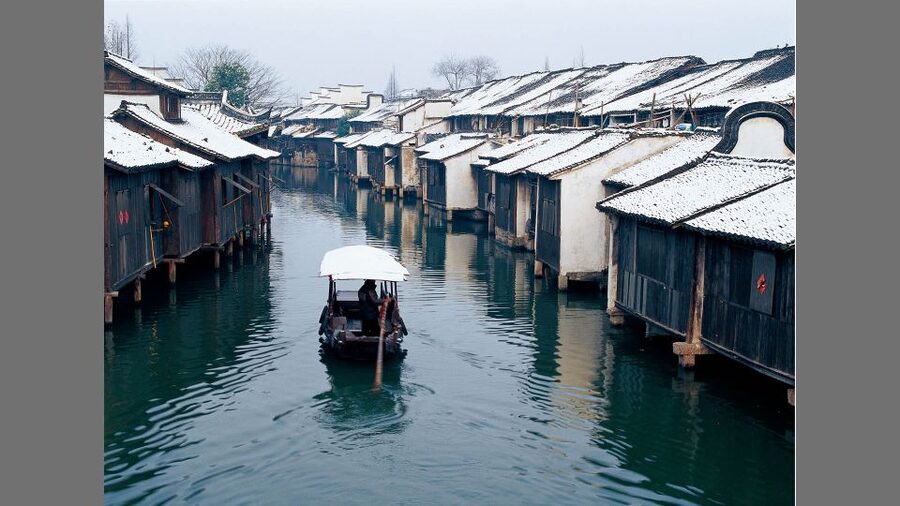 Delve into Wuzhen Water Town: Private Tour from Shanghai - Entering Dong Zha, Wuzhen’s East Gate