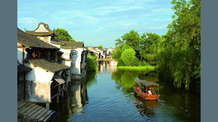 Delve into Wuzhen Water Town: Private Tour from Shanghai - The canal boat ride