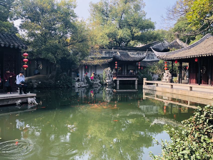 Discover Suzhou & Zhouzhuang: Private Day Trip - Zhouzhuang by canal, boat, and old stone streets