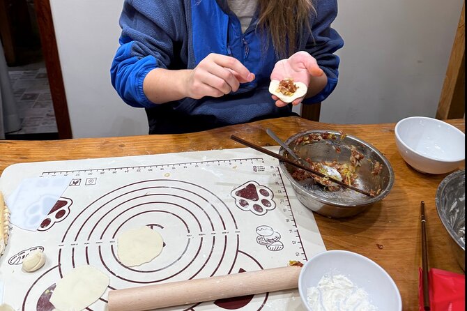 Dumpling Cooking Class and Local Market Tour - Pick a filling, including vegan choices