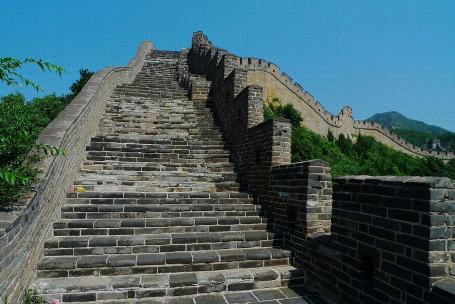 From Beijing: Badaling Great Wall Bus Group Tour - What the bilingual guide adds