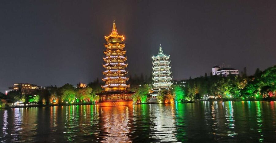 Guilin: Four Lakes Night Cruise with Round-trip Transfer - Boarding the sightseeing boat