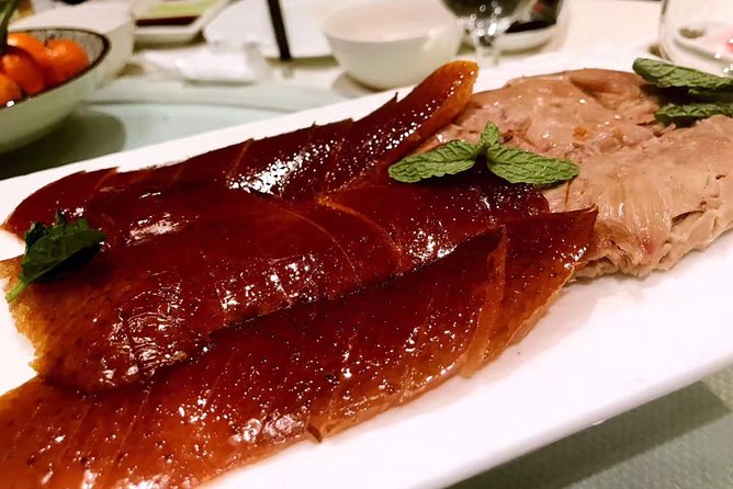Half Day Tour:Market Shopping Acrobatic Show & Peking Duck dinner - Who will get the most from this $148 experience?