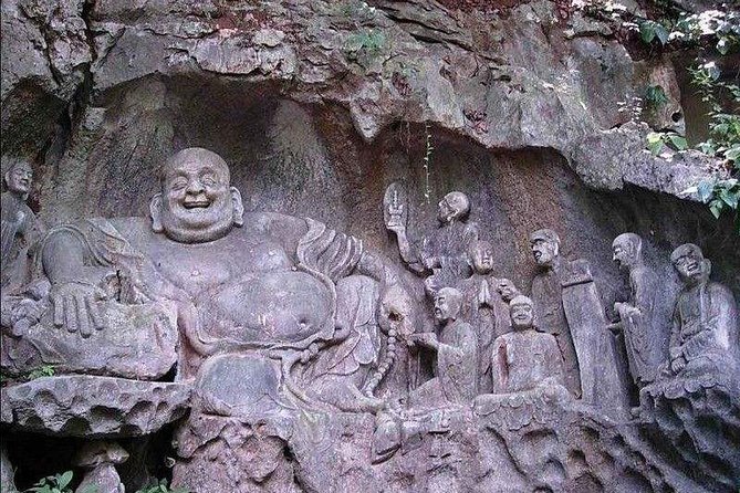 Hangzhou Private Flexible Day Tour with West Lake Boat Cruise - Fei Lai Feng: stone Buddhas in a wooded setting