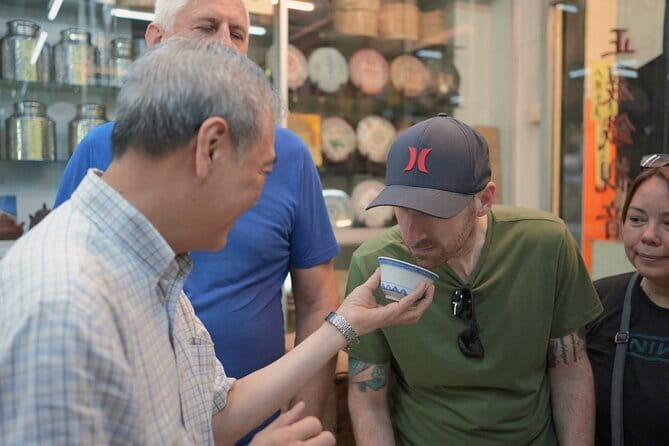 Hong Kong Street Food Tour with Locals - Dim Sum, Wonton & more - Meeting your guide near Grand Millennium Plaza