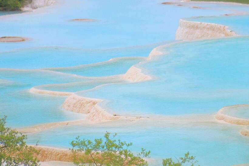 Huanglong Scenic Area: Explore Stunning Five-Colored Ponds - Why Huanglong feels unlike an ordinary mountain park