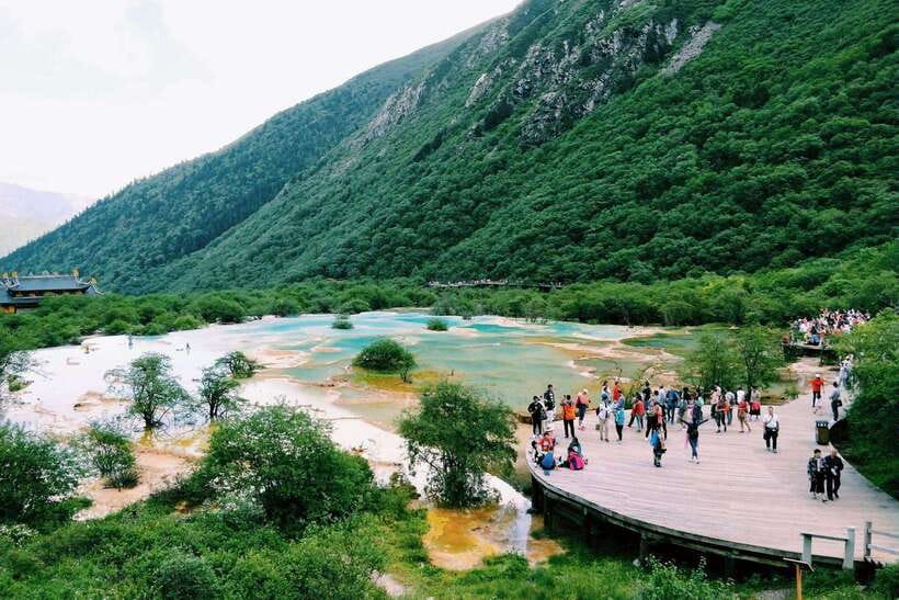 Huanglong Scenic Area: Explore Stunning Five-Colored Ponds - The six-hour route through Huanglong Valley