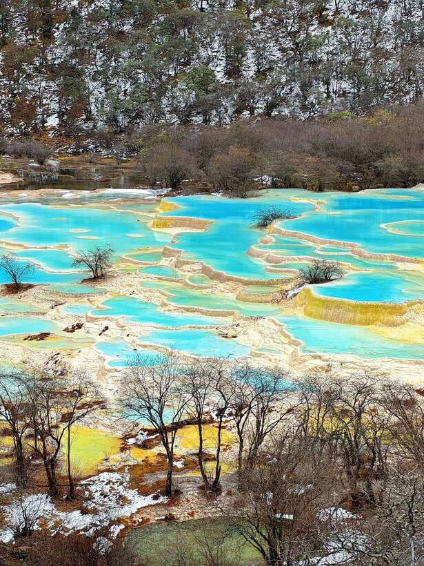 Huanglong Scenic Area: Explore Stunning Five-Colored Ponds - Starting at the visitor center or cableway station