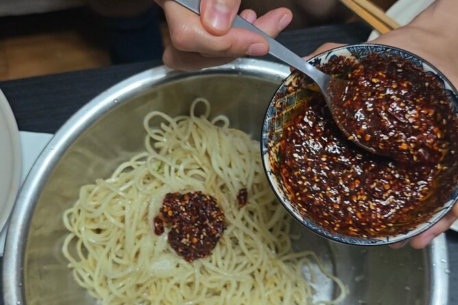 Learn cold noodle and wolf-teeth potato at local home - Timing, group size, and practical details