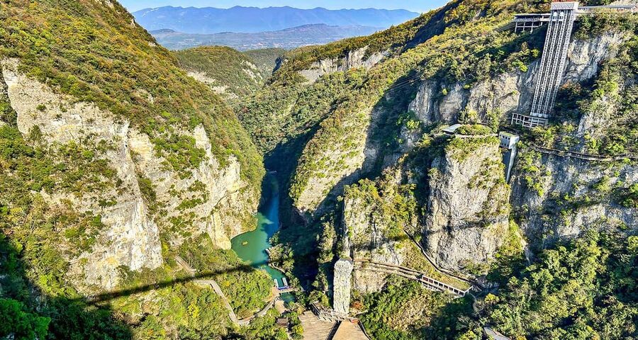 One Day Mini Group Tour to Glass Bridge and Tianmen Mountain - The 99 bends and the 12-level escalator