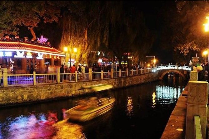 Private Night Tour: Discover Beijing in Bustling Lights - Jingshan and the Forbidden City walls at night