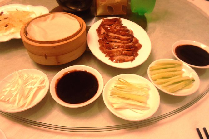 Private Tour to Pearl Market Acrobatic Show & Peking Duck Dinner - Why this five-hour evening works
