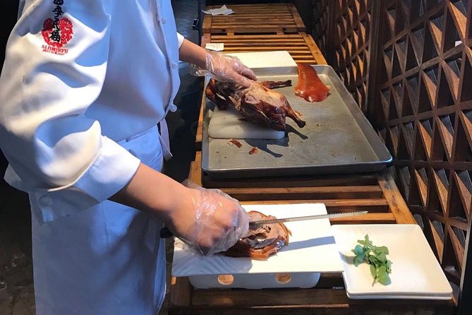 Private Tour to Pearl Market Acrobatic Show & Peking Duck Dinner - Timing, seats, and small details to check
