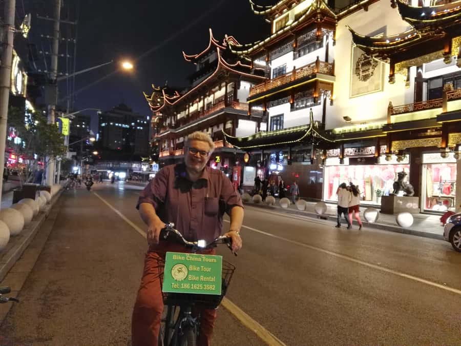 Shanghai: 4-Hour Nightlife Adventure & Tasting Bike Tour - Yu Garden at night and the market atmosphere