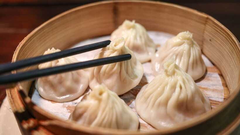 Shanghai: Evening Walking Food Tour - Shanghai’s sweet secret: mango, sago, and pomelo
