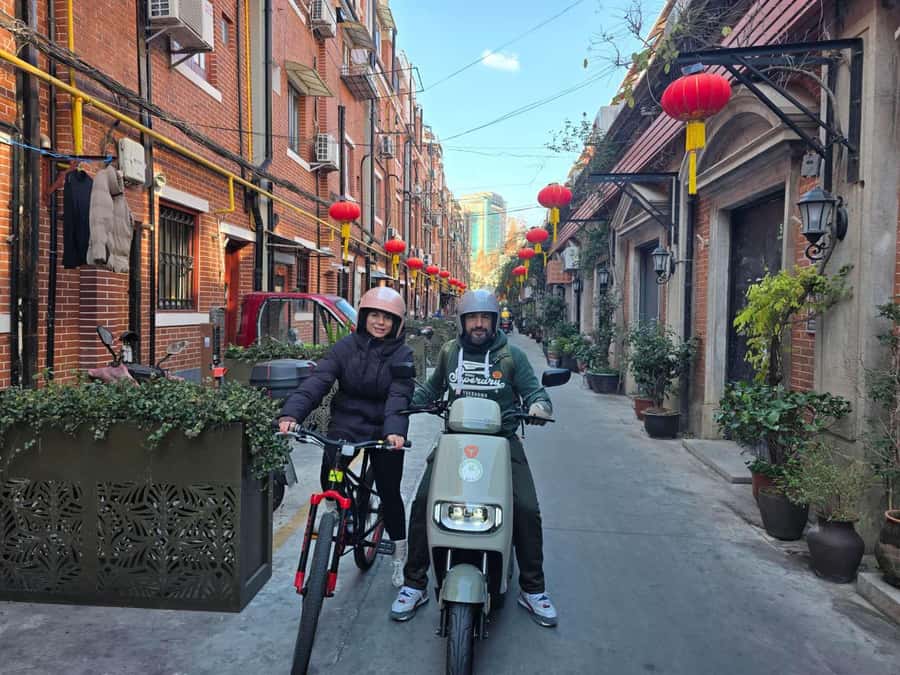 Shanghai Must-See and Foodie Test Bike Tour( Day & Night) - Yu Garden Bazaar and the old city lanes