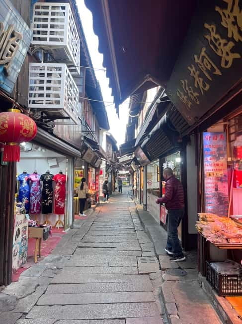 Shanghai: Zhujiajiao Water Town with Calligraphy Experience - Guides who shape the day