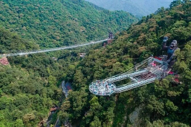 Skywalk Glass Bridge and Waterfall Ravine Half Day Private Tour - Walking the green trail into the canyon