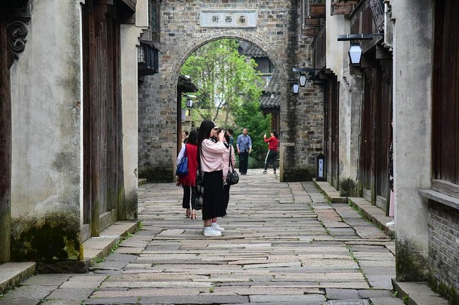 Wuzhen and Xitang Water Town Private Full Day Trip from Shanghai with Lunch and Dinner - Wuzhen: bridges, lanes, and a gentle canal cruise