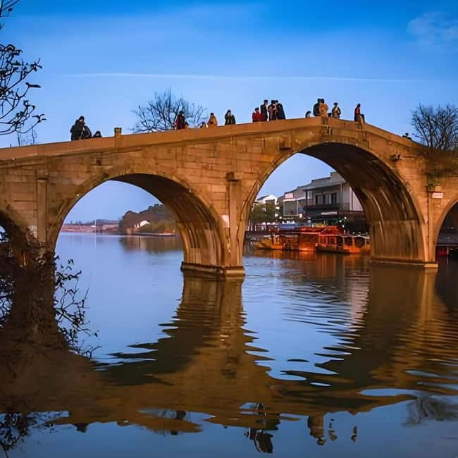 Yu Garden, Old Street, Bund & Zhujiajiao Water Town Bus Tour - Returning to Shanghai and ending at the Bund