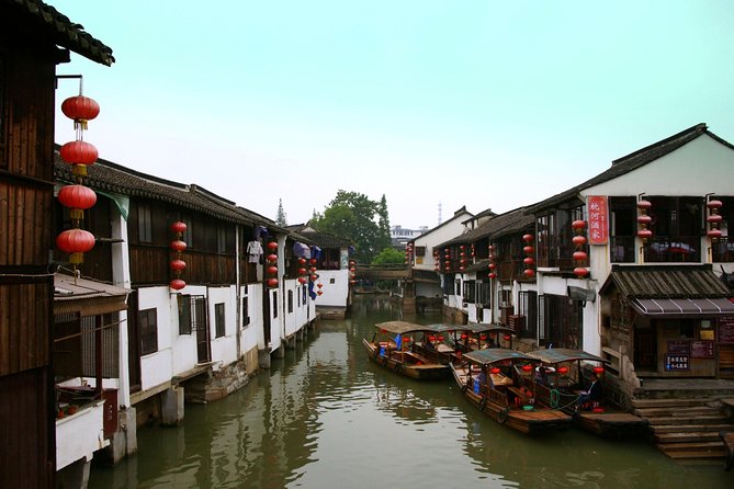 Zhujiajiao Water Village Half Day Tour - Temples, homes, and local belief